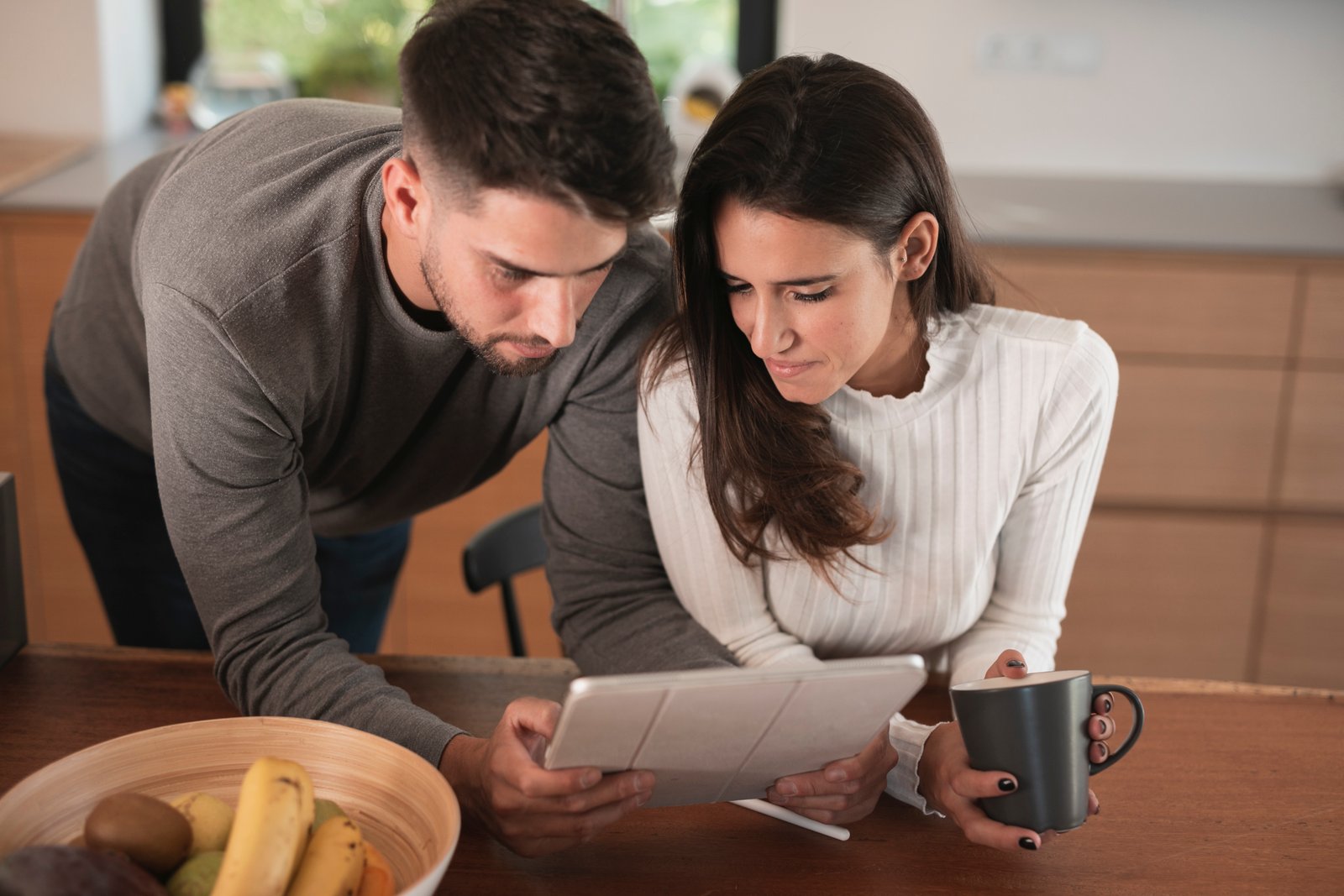A couple checking their insurance score